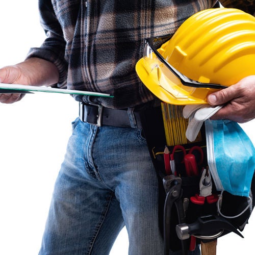 Close up view of contractor holding his gear and clipboard